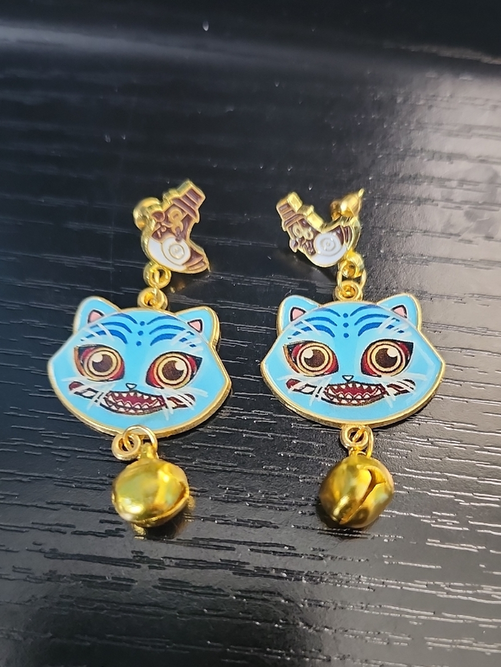 K Pop Demin Hunter Derpy Tiger Dangle Earrings with Gold Bells